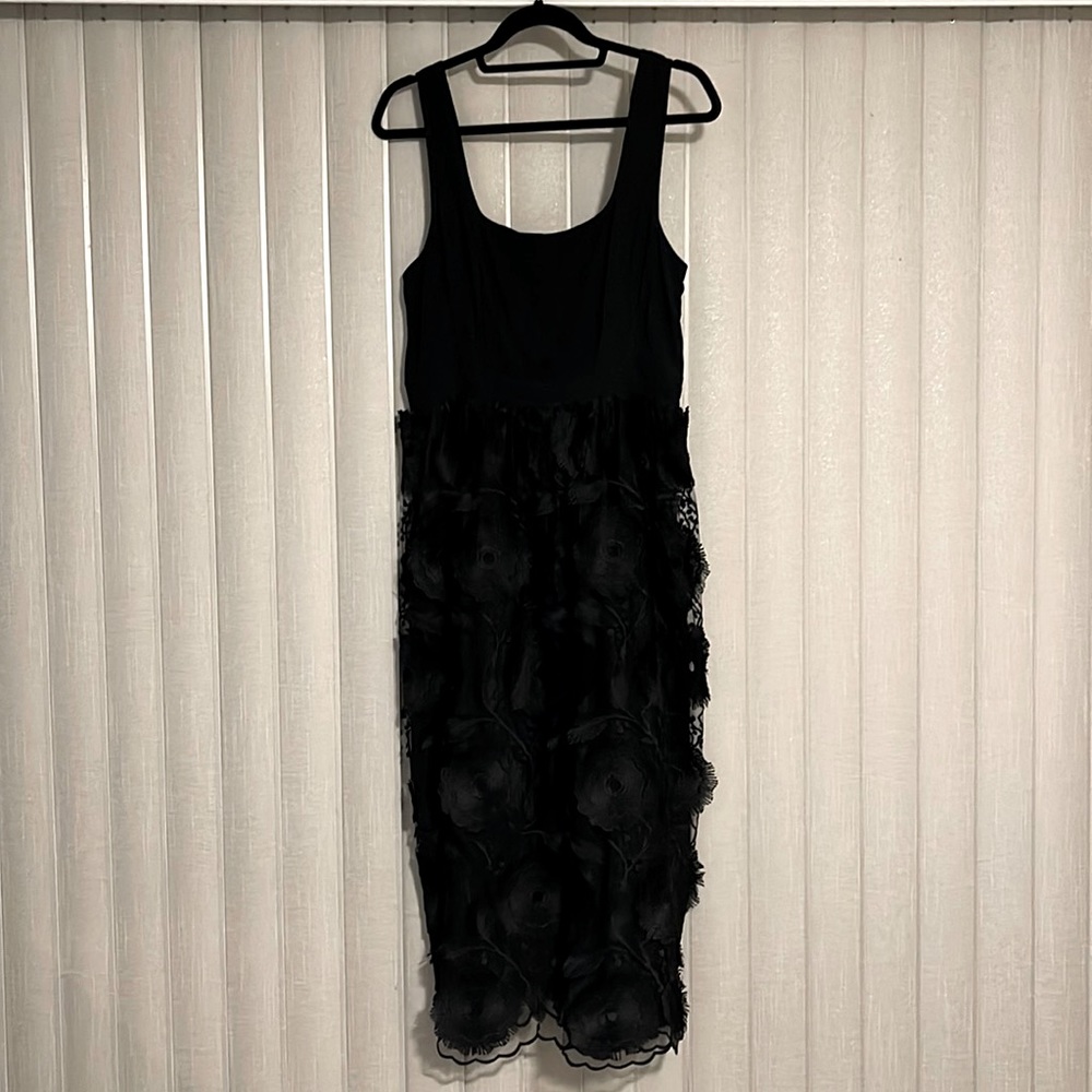Black empire waist dress with fun lace 3D flower pattern. For anything special